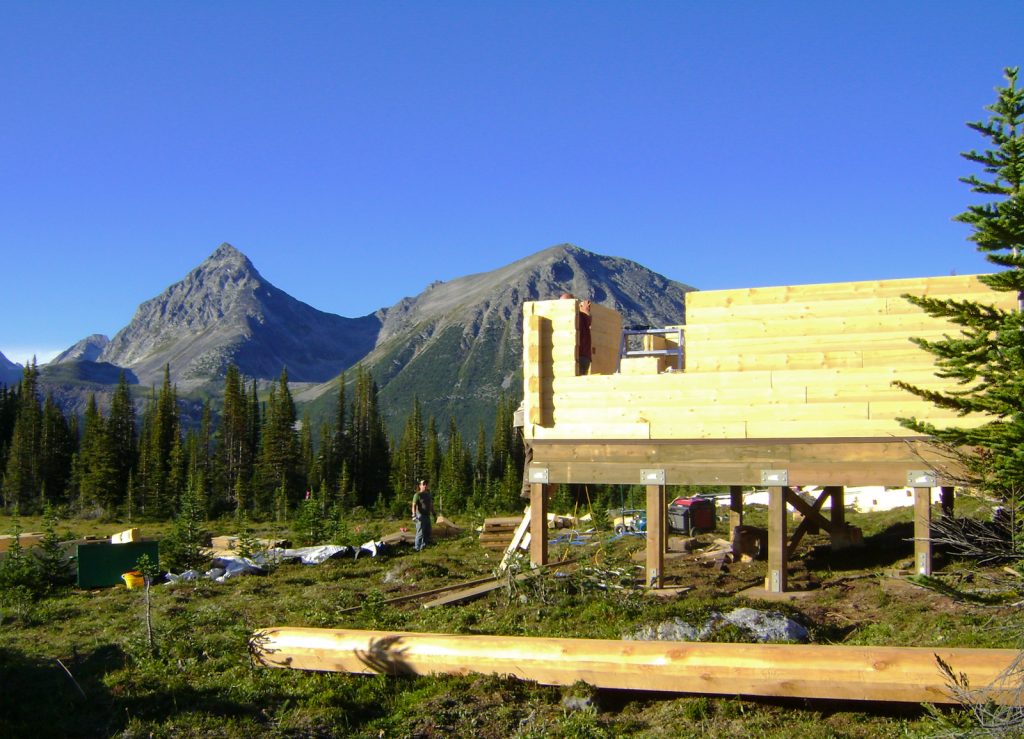 Construction underway building the walls of the mallard mountain lodge