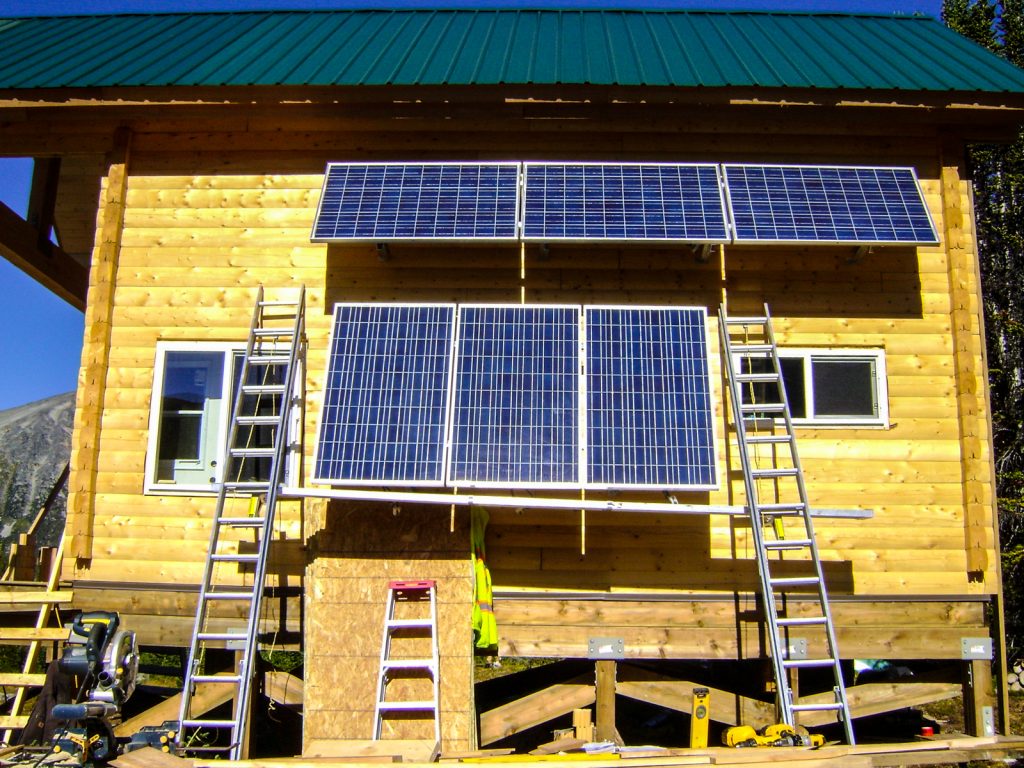 Solar panels being installed on the new Mallard Mountain Lodge