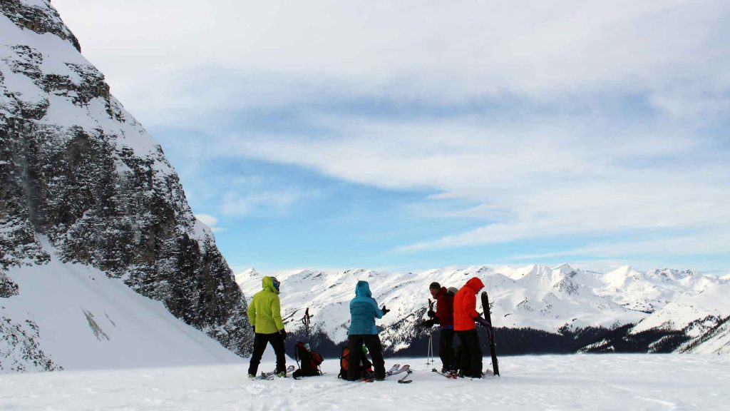 skiers adjusting their gear