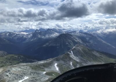 view from helicopter in rocky mountains of Canada