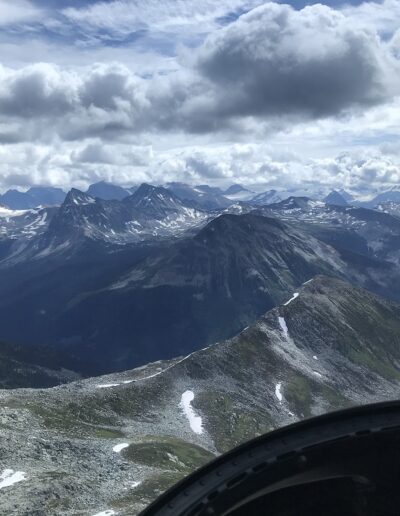 view from helicopter in rocky mountains of Canada