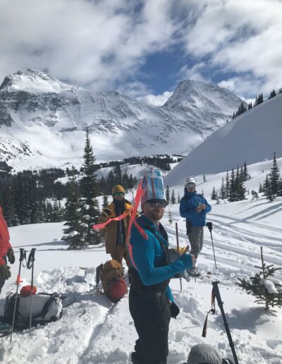 group of ski touorers with funny hat