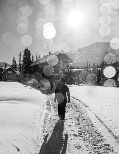 backcountry lodge and person walking